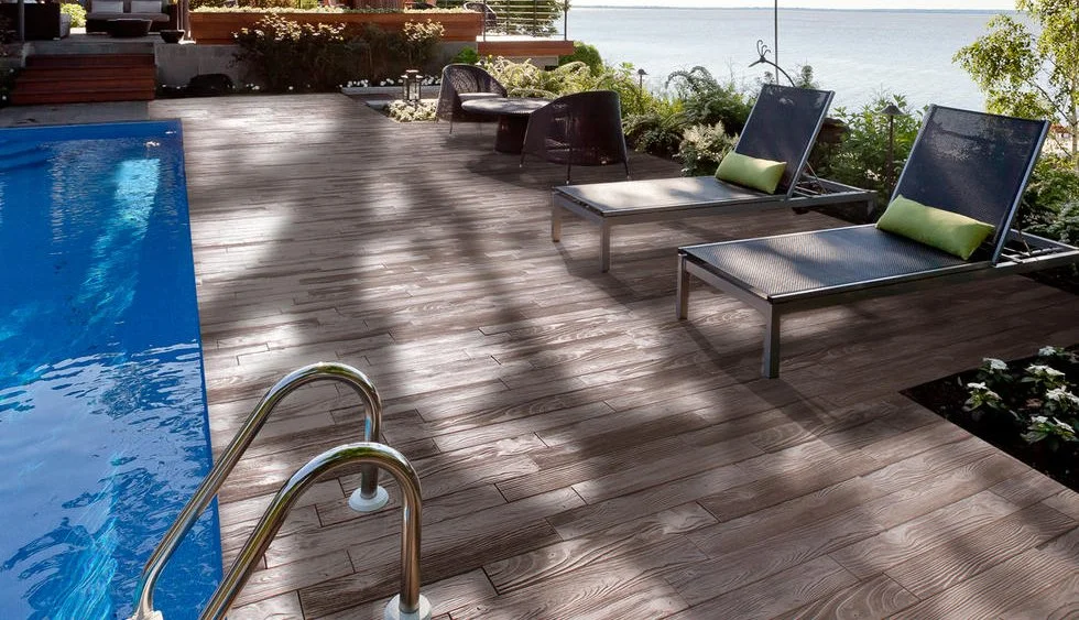 Custom interlocking poolside patio in Whitchurch-Stouffville designed and installed by KANU Interlocking with high-quality stone pavers