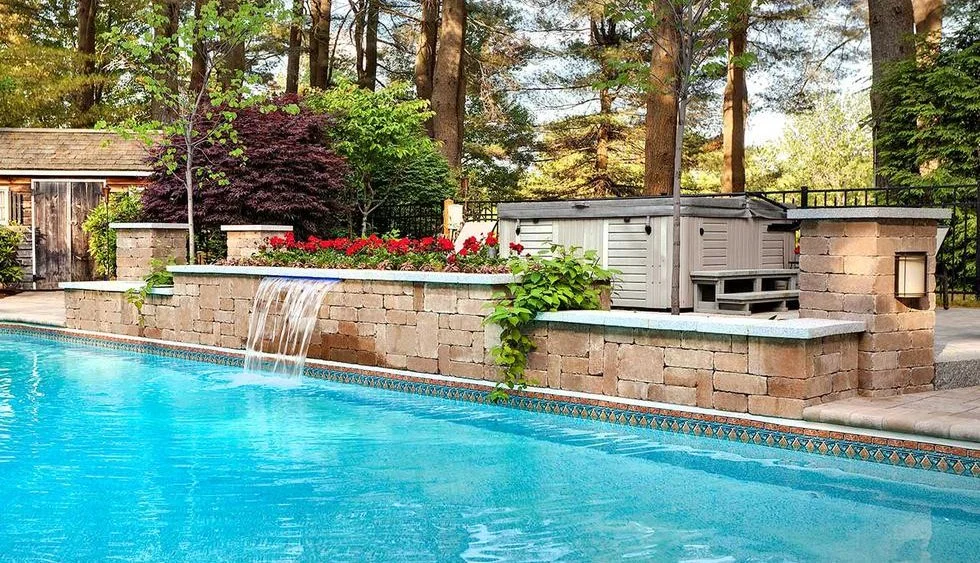 Interlocking retaining wall in Mississauga designed and installed by KANU Interlocking with premium stone blocks