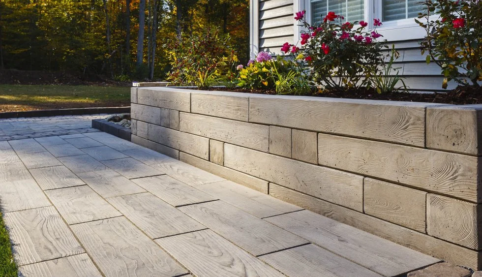 Interlocking retaining wall in Richmond Hill designed and installed by KANU Interlocking with premium stone blocks