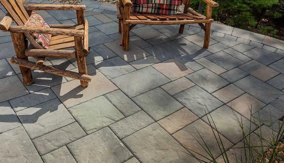 Stone patio installation in Whitby by KANU Interlocking