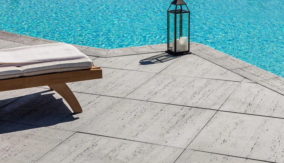 Custom interlocking poolside patio in Pickering designed and installed by KANU Interlocking with high-quality stone pavers