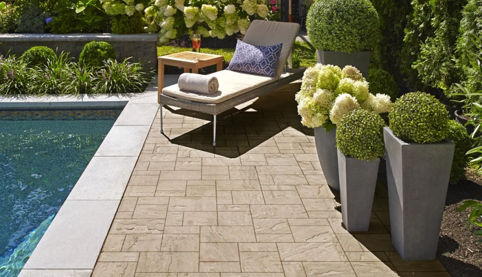 Custom interlocking poolside patio in Scarborough designed and installed by KANU Interlocking with high-quality stone pavers
