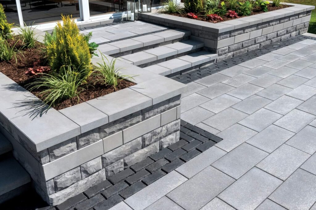 Interlocking retaining wall in Scarborough designed and installed by KANU Interlocking with premium stone blocks